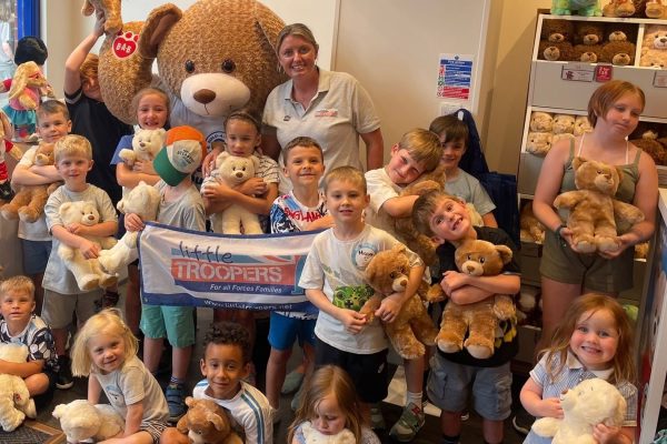 Louise Fetigan, founder of Little Troopers with children at Build-A-Bear Windsor